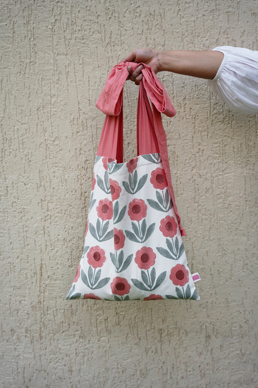 Fabric bag with floral pink pattern