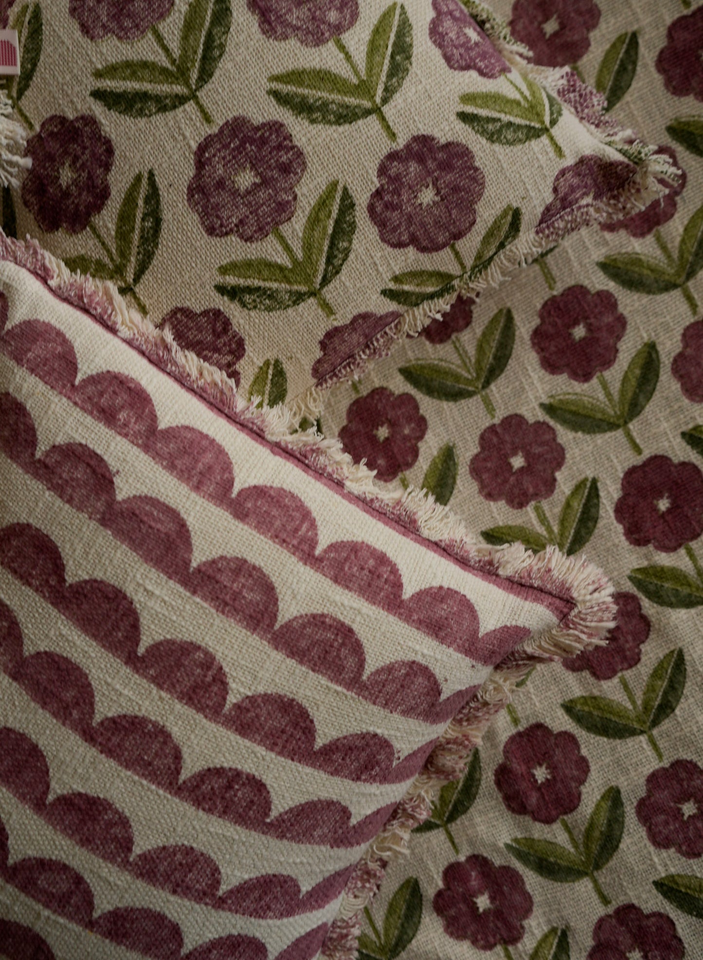 Close-up of fabric with floral and striped patterns